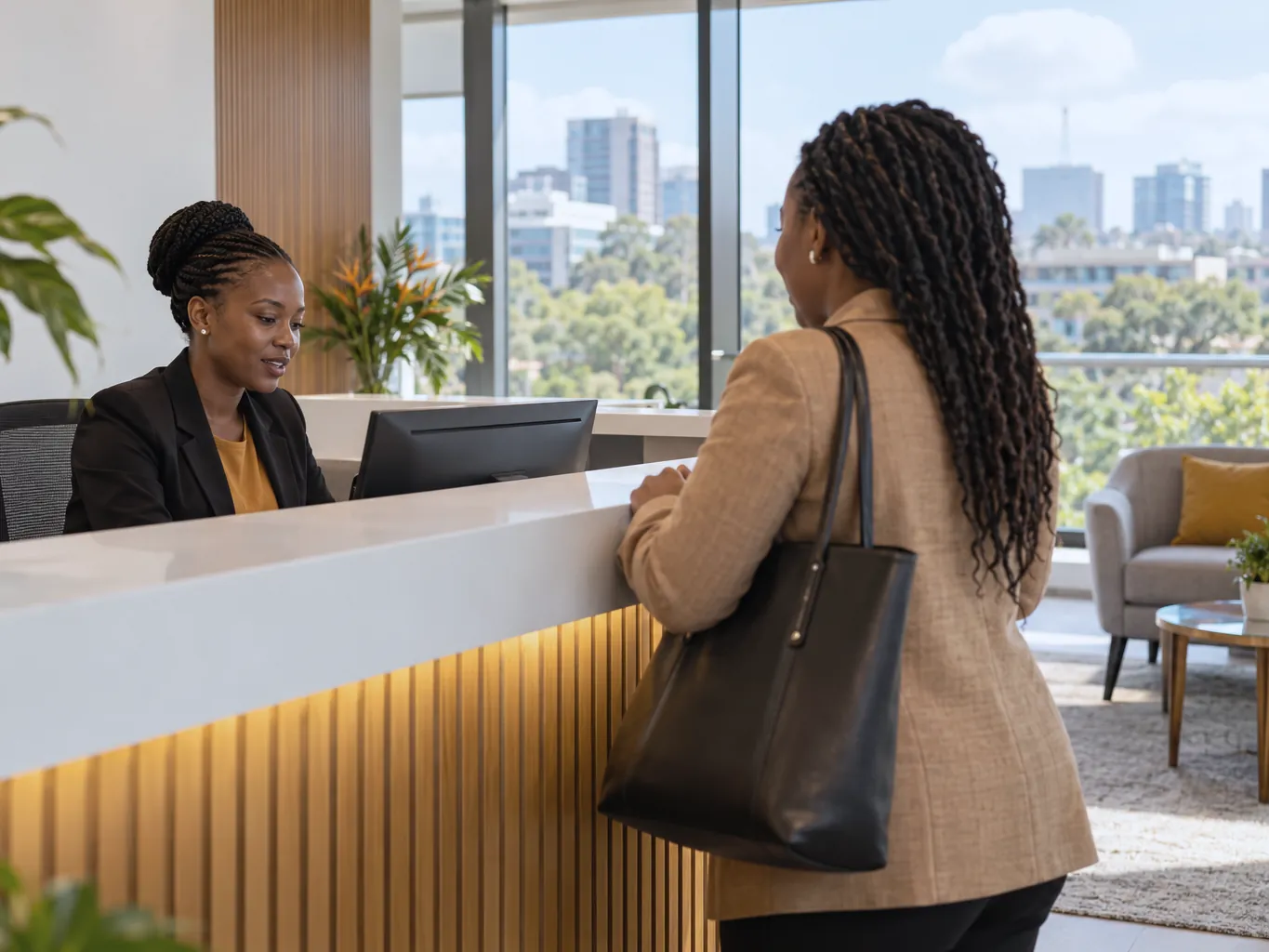 A visitor being welcomed at an office reception in Nairobi